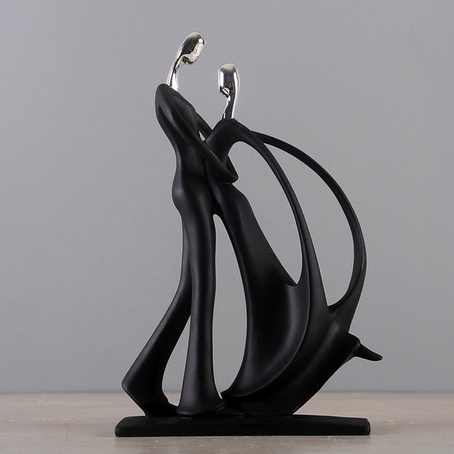Abstract dancing couple statue