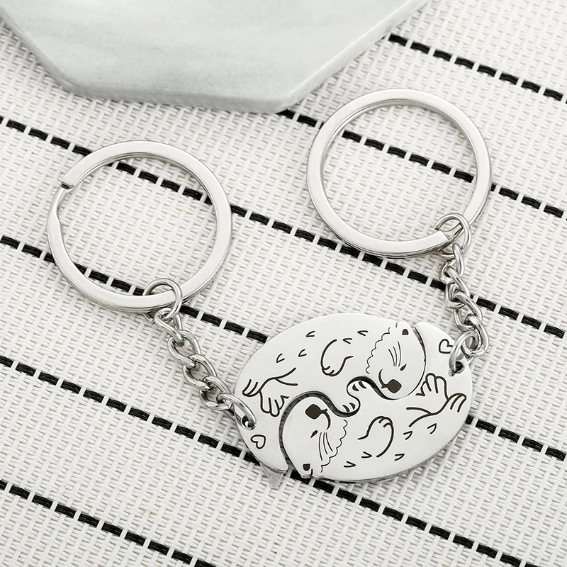 Interlocking Otter Keychain