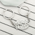Interlocking Otter Keychain
