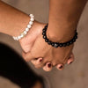 Matching black and white couples bracelets