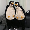 Penguin Onesie Couple