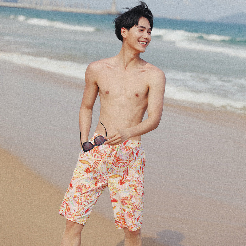 Printed matching swim suits for couples